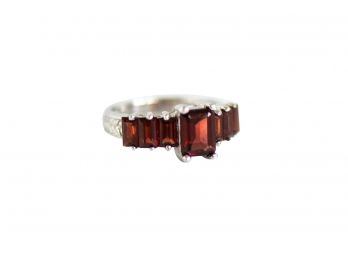Size 7 10k White Gold And Garnet Stone Ring With Emerald Cut Design