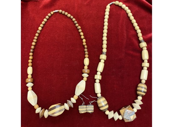 Two Wooden Necklaces And A Pair Of Matching Earrings