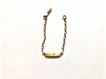 Dainty Gold Tone And Pearl Insignia Bracelet