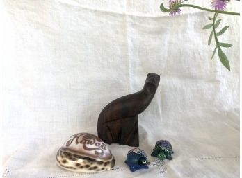 Cute Grouping Of Hand Carved Ironwood Seal And Souvenirs