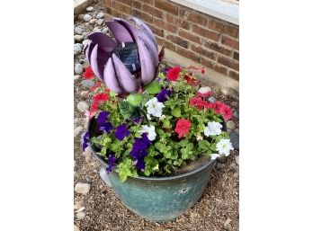 Beautiful Flowers In Pot With Large Solar Metal Flower (Pot Has A Crack)