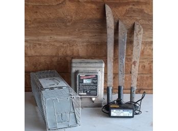 Lot Of Machetes, 1 Trap And A Energizer Electric Fencer