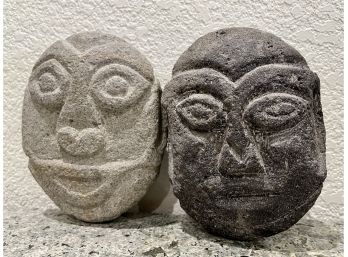 2 Carved Stones Faces
