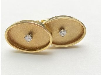 A Pair Of Two 14k Gold Cuff Links With Diamond Center 8.77grams