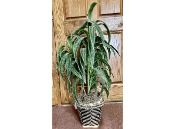 Tropical Faux Plant In A Woven Basket