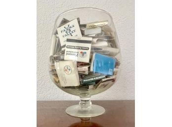 Glass Vase Filled With Vintage Match Books