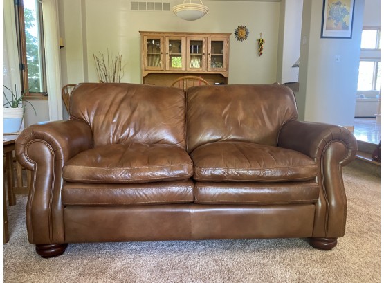 Beautiful Cognac Leather Loveseat With Roll Arm Detail & Tan Leather Stitching