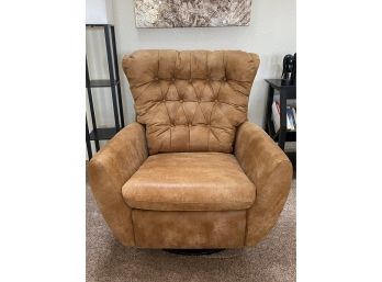 A Handsome Leather Swivel Tufted Chair In Tan