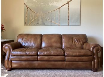 Beautiful Cognac Leather Three Cushion Roll Arm Sofa With Tan Accent Stitching