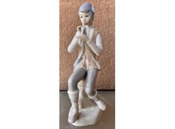 Boy Playing The Flute Figurine  By Napcoware