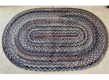 Two Matching Oval Floor Rugs