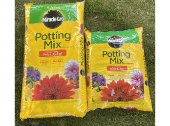 Two Unopened Bags Of Miracle Grow Potting Mix