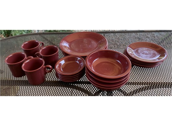 A Place Setting Of 4 Fiesta Ware