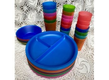Lot Of Colorful Plastic Plates And Cups