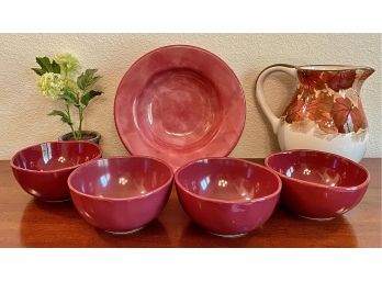 A Cute Lot Of Maroon Colored Bowls With A Fall Pitcher And More.