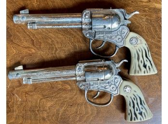 Two Western Style Toy Pistols