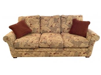 Floral Upholstered Beige Lazy Boy Couch With Two Throw Pillows