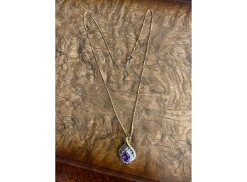 Sterling Silver Necklace With Diamond Like Accents And Purple Stones