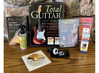 Lot Of Beginner Guitar Accessories And Guides