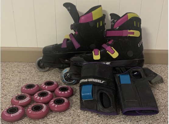 A Pair Of Size 10 Bauer Rollerblades W Additional Wheels