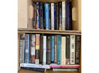 Two Boxes Of Books Incl. A Woman In Charge
