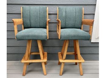 2 Oak Swivel Bar Height Stools With Green Upholstery