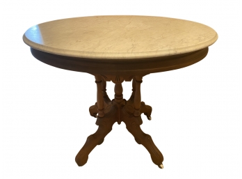 Antique Round Table With Marble Top And Wood Legs On Casters