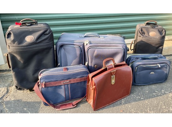 Lot Of Suitcases And Leather Breifcase