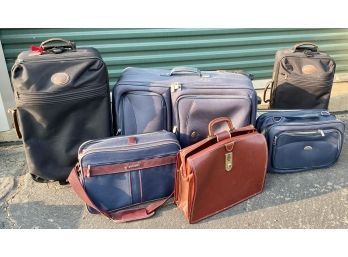Lot Of Suitcases And Leather Breifcase