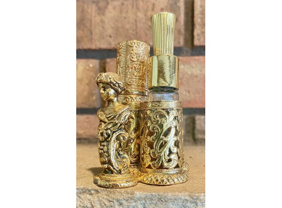 Gold Toned Perfume Holder With Figure Of Woman, 'perfume Fleurs De Rocaille', 'heaven Sent' And One Unmarked