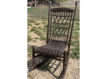Brown Wicker And Wood Rocking Chair
