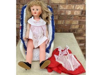 Large Doll W Carseat And An Extra Outfit