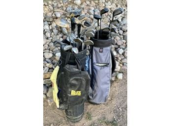 Two Golf Caddy Bags With Complete Sets Of Putters, Drivers And Irons