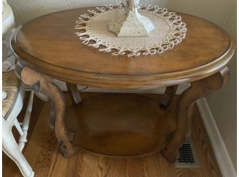 French Provincial Oval Occasional Table In Medium Walnut Finish