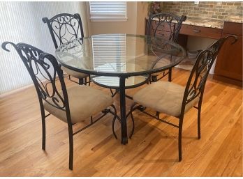Round Glass And Metal Dining Table With Black And Gold Accents
