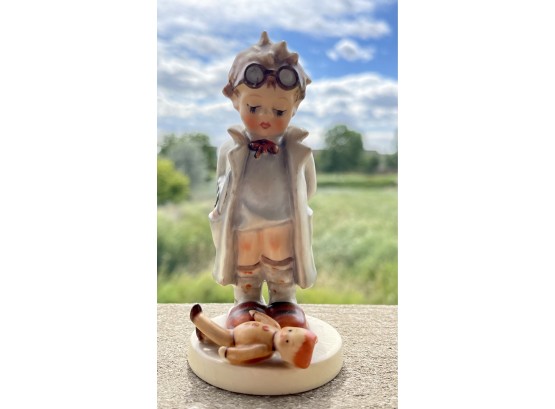 Goebel-Hummel Boy With Glasses & Broken Doll Figurine