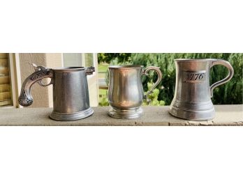 3 Pewter Like Mugs Including One With Pistol Handle