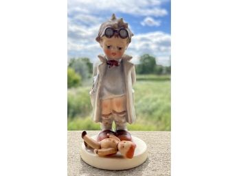 Goebel-Hummel Boy With Glasses & Broken Doll Figurine