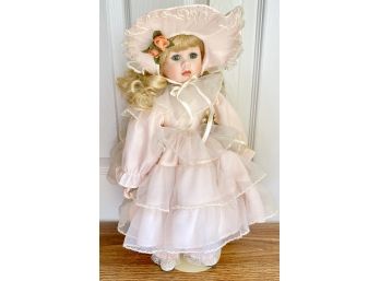 16.5' Porcelain Doll In Ruffled Dress