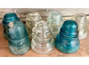 Seven Antique Glass Electrical Insulators (Some Have Cracks Or Chips)