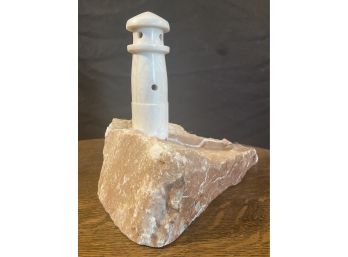 Light House Lamp On Pink Granite