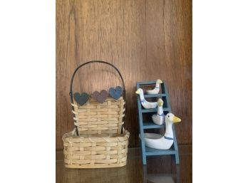 Cute Blue Ladder Like Shelf With Duck Teaspoons And Small Hanging Basket.