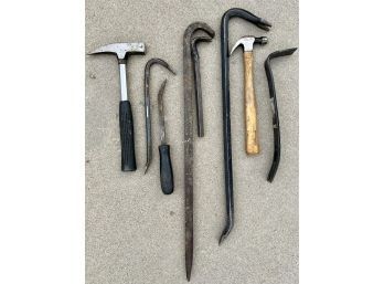 Collection Of Crow Bars And Hammers