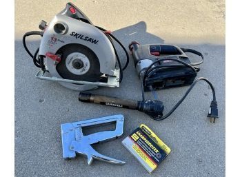 Variable Speed 53mm Sabre Saw And A Circular Saw. Also A Duracell Flashlight
