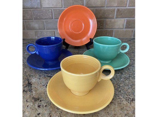 7 Pc Vintage Fiesta Ware 3 Cups- 4 Saucers. 1of 2.