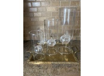 Collection Of Glass Oil Diffusers On Gold Toned Tray