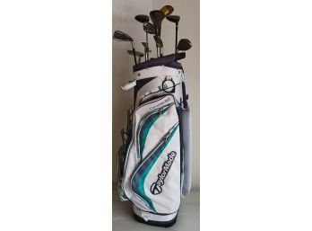 Taylor Made Golf Bag With Assorted Clubs.