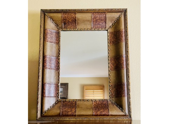 Ornate Wall Mirror With Leather Like Trimmed Frame