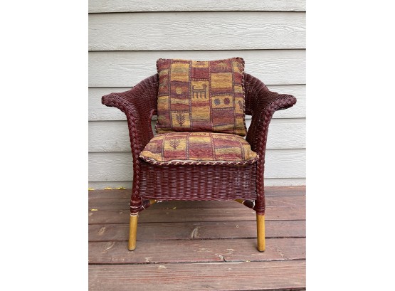 Burgundy Wicker Chair With Southwestern Pattern Cushions