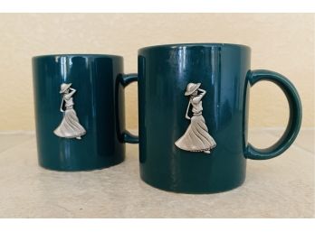2 Green Mugs With Pewter Lady Emblem